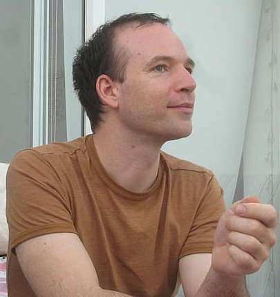 Jason Meggs ponders during a visit to China, consulting on the environmental health and sustainability implications of land use and transportation chocies.